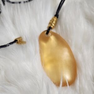 Gold Oval Limited Pendant Necklace with Glossy Finish